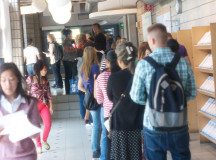 Students line up to visit the office of the registrar for various reasons, like paying tuition, switching programs, or buying a parking pass.