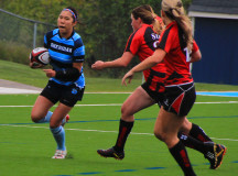 Cecilia Lac sprinting with the ball 