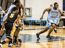 Chris Muir (#15) takes off on the fast break
