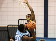 Trevor Williams (#30) rises up against resilient Cambrian defence. Williams led Bruins' point production with 27 points.