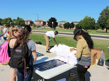 Free swag and promos at the frosh out loud table!