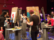 Artists battled within a blue tarp arena. They were allowed to bring their own supplies and paint whatever they wished. 