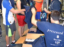 Sheridan Student Union hands out free t-shirts to students working out in the Athletics Centre.