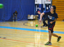 Students get active in a game of dodge ball inside the gym at Healthy Heart Day.