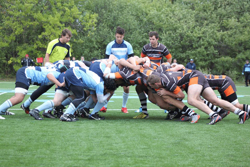 The Bruins and the Mountaineers awaiting the ball in the scrum. 
