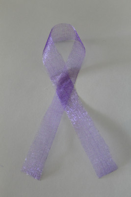 Raise awareness about domestic violence this October by wearing a purple ribbon. 