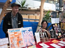 Jesse DeNobrega, second year illustration and one of the organizers of the Zine Fest, shows off his posters and comics. Christine Wong, second year animation, shows off the work of her Comic Making Club members.