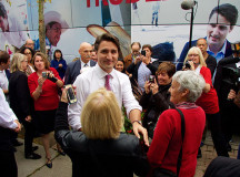 Justin Trudeau shakes hands and takes a photo with a former Sheridan Journalism Print program coordinator, Mary Lynn O'Shea. 