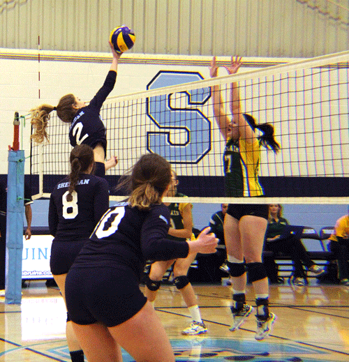 Amanda Manley with a quick tip over the net. (Photo by Natalia Camarena/The Sheridan Sun)